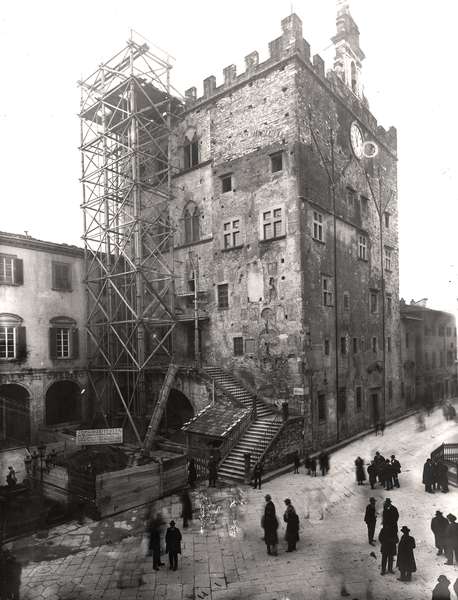 black and white photo of Palazzo Pretorio during restoration